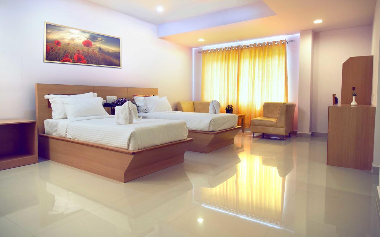 Hotel Rainbow Suites Каннур Экстерьер фото